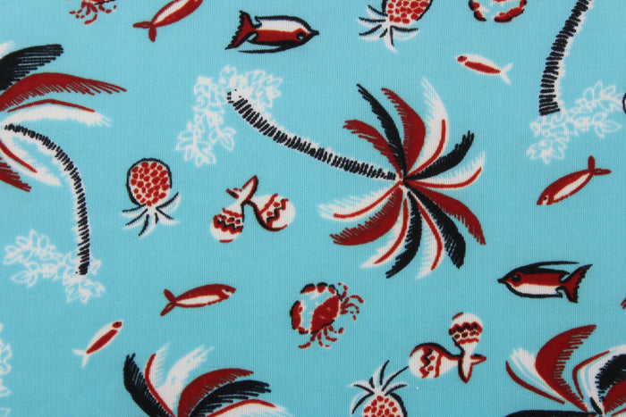 This fabric  has a tropical theme featuring palm trees, fish and fruit in red, black and white against a light blue background.  It is durable and breathable and will allow movements of the body.  Uses include dance and sports wear, leotards and dresses.  We offer several different lycra fabrics.