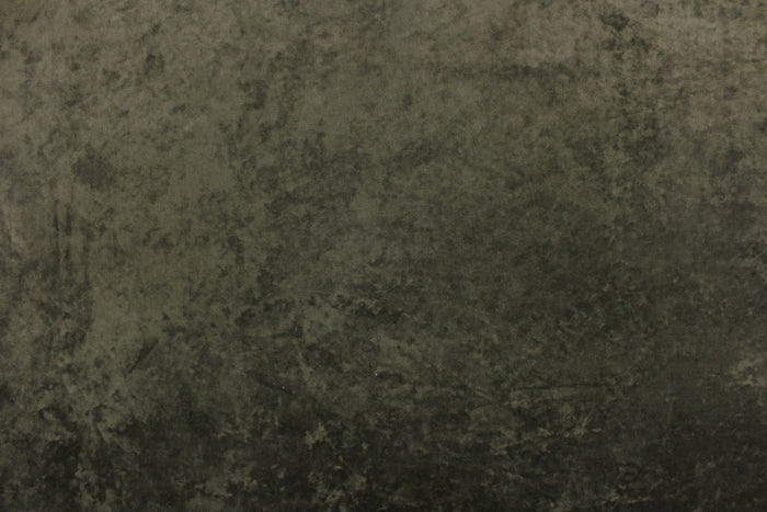This velvet features a beautiful crushed solid dark  gray green color.