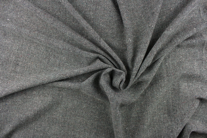 This wool blend fabric is great for transitioning into cooler weather.  It has a great hand and is hard-wearing.   The durability and wrinkle resistance make it perfect for suits, tailored garments, drapery and light duty upholstery fabrics.  Colors included are green and black.